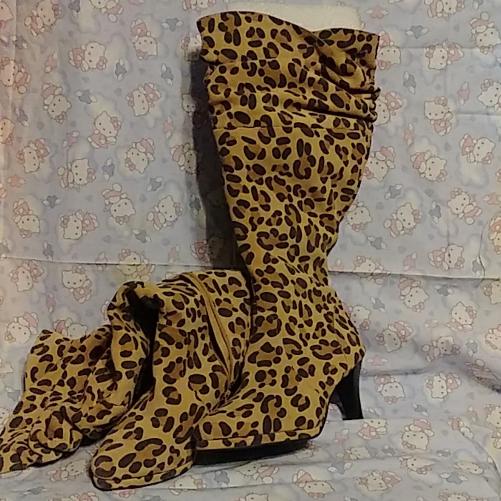 Knee high leopard boots